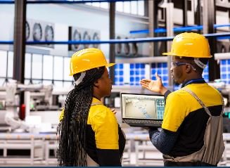 Industrial engineers on site wearing helmets representing Rig Supply & Field Operations Support